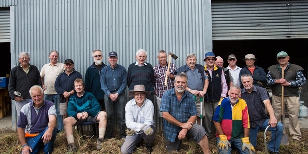 PITCHED IN: Members hold a working bee to start clearing the site in preparation for the further development of the shed and land around them. PHOTO/SUPPLIED.