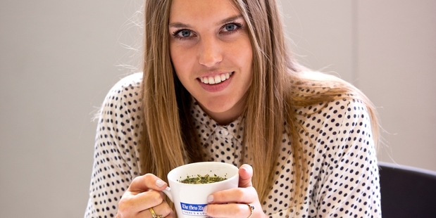 Morgan Tait samples one of the detox teas promoted in the diet. Photo / Dean Purcell