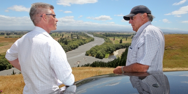 Peter Butler (right) shows Hawke's Bay Today reporter Simon Hendery the state of Waipawa River, viewed from his farm. Photo/Glenn Taylor