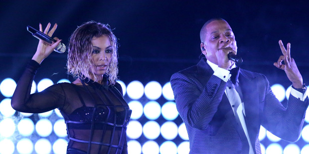 Beyonce and Jay-Z perform at the 56th annual Grammy Awards. Photo/AP