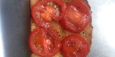 Hot sauce with tomato on toast is simply delicious.
