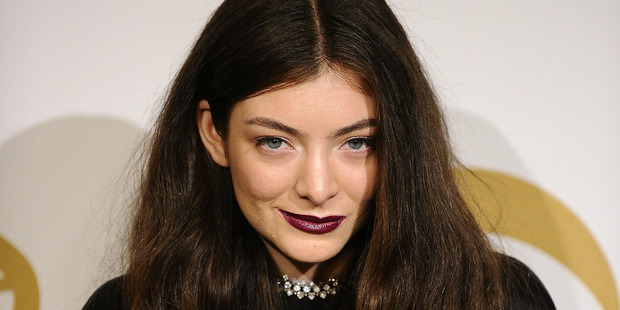Lorde's Grammys makeup was done by New Zealander Amber Dreadon of M.A.C. She wears one of her favourite lip colours M.A.C Heroine. Photo / Jason LaVeris courtesy of Getty Images and M.A.C