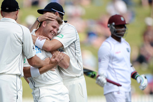 Corey Anderson celebrates the wicket of Marlon Samuels against the West Indies.