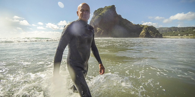 Long-time Piha resident Steve Davis rues the loss of famous surf breaks as sand continues to pile up off the west coast beach. Photo / Michael Craig