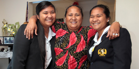 Proud mum Aipoi Pauli with Pemita (L), who's taking over the role of head girl from her sister Phyllein (R). Photo / Doug Sherring