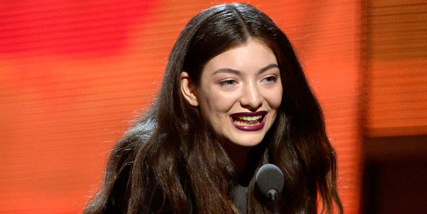 Singer Lorde accepts the Best Pop Solo Performance award for 'Royals. Photo / AP