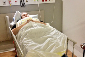 Kim Dotcom tweeted from his hospital bed: 'X-ray showed foot fracture. Can't move, severe back pain.'