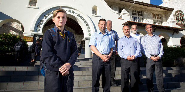 Ben Gaze on his first day at Auckland Grammar with (from left) his father Philip, grandfather Stuart, uncle Jonathan, great-uncle Franklin and uncle Andrew. Photo / Sarah Ivery