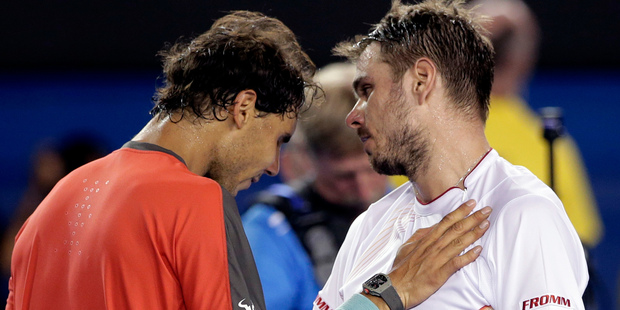 A defeated Rafael Nadal congratulates Stanislas Wawrinka after losing the Australian Open final. Photo / AP