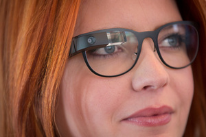 The new Google Glass "Bold" prescription frames in shale color are modeled at the Google Glass Basecamp space in New York. AP Photo