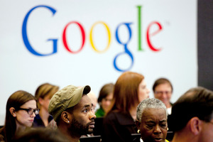 People at a workshop, "New York Get Your Business Online," at Google offices in New York. The internet giant is about to split its shares for the first time. File photo / AP
