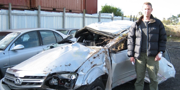 Former policeman Simon Cathcart suffered a cracked spine in the crash that wrecked his car.