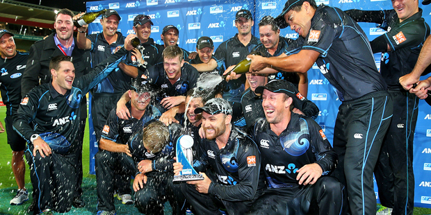 New Zealand celebrate their series win following game five of the one day international series against India. Photo / Getty