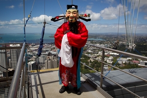 The God of Fortune, Cai Shen, will take a SkyJump from the top of the Sky Tower tonight. Photo / Sarah Ivey