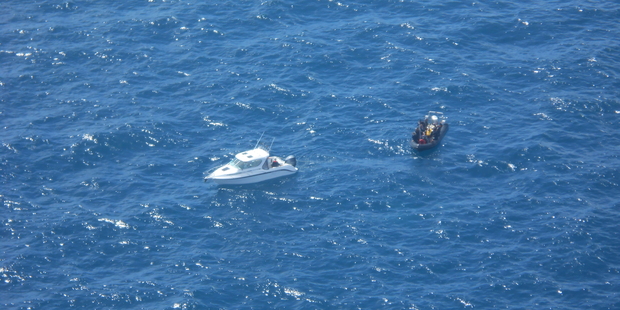 Eight people were rescued from a sinking inflatable vessel near Little Barrier Island. Photo / supplied