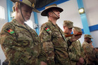 Soldiers for the International Security Assistance Force (ISAF) attend a ceremony at the ISAF headquarters in Kabul, Afghanistan on Sunday. The United States and NATO formally ended their war in Afghanistan on Sunday with the ceremony at their military headquarters in Kabul. Soldiers for the International Security Assistance Force (ISAF) attend a ceremony at the ISAF headquarters in Kabul, Afghanistan on Sunday. The United States and NATO formally ended their war in Afghanistan on Sunday with the ceremony at their military headquarters in Kabul.