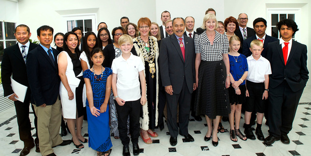 All of the new New Zealanders at the citizenship ceremony at Government House in Wellington. Photo / Marty Melville