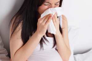 The more colds and other infections a woman had, the more likely she was to give birth to a baby that developed asthma.
Photo / Thinkstock