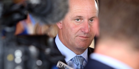 John Key fronts the media at Waitangi.