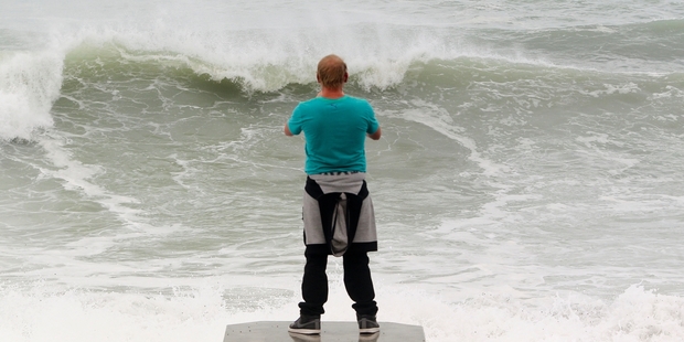 The beach along Marine Parade in Napier was closed for swimming but not for taking photos. Photo/Warren Buckland