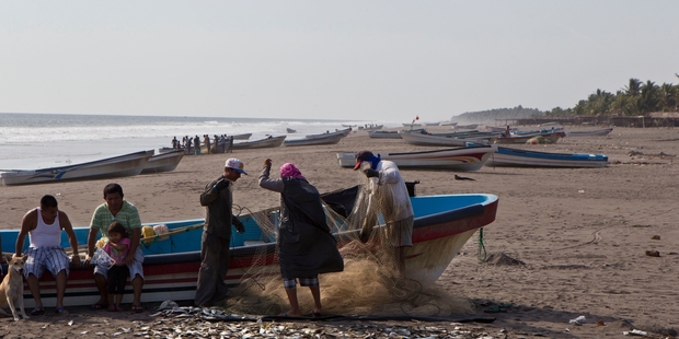 Fishermen at work in Jose Salvador Alvarenga's family's home village in El Salvador. Photo / AP