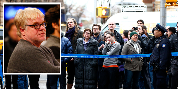 People look toward the home of Philip Seymour Hoffman in New York. Photo / AP , Getty Images