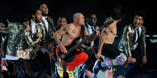 The Red Hot Chili Peppers and Bruno Mars perform during the halftime show of the NFL Super Bowl XLVIII football game between the Seattle Seahawks and the Denver Broncos. Photo/AP
