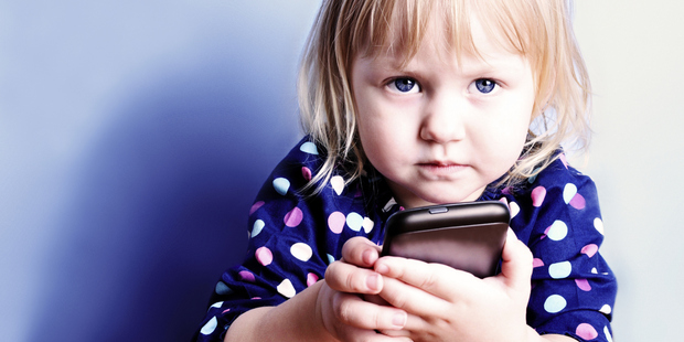 By the age of 3-5, more children are able to navigate a smartphone. Photo / Thinkstock