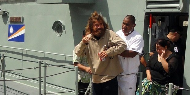 Mexican castaway who identified himself as Jose Ivan steps off the 'Lomor' Sea Patrol vessel in Majuro with help from a nurse. Photo / AFP