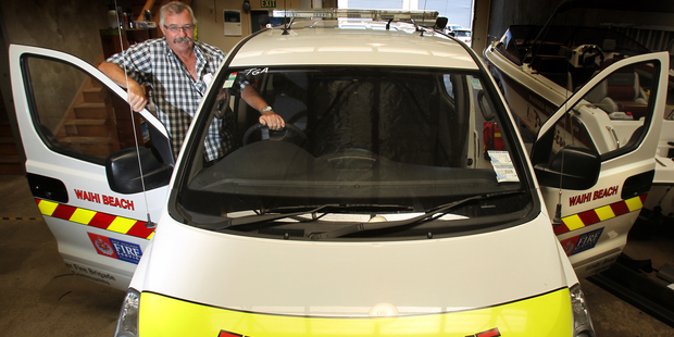 Waihi Beach fire chief Ian Smith is thrilled to have a new fire rescue van. Photo/John Borren