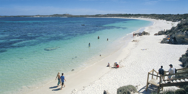Holidaymakers make the most of Rottnest Island's beautiful white sand beaches and sparkling water.