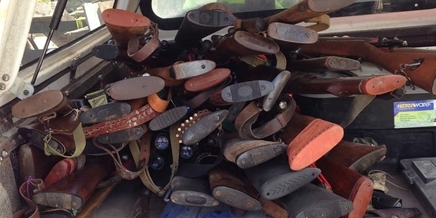 Police remove massive arsenal.