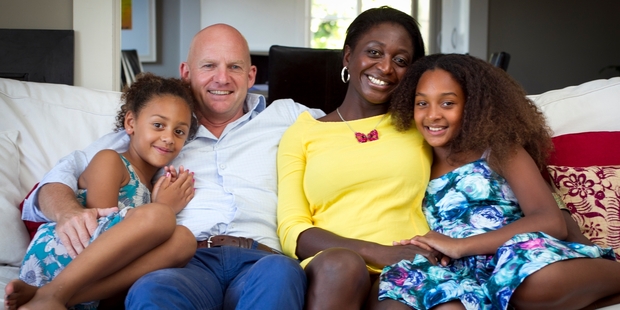 Jamie Whyte with his wife, Zainab Sokona-Whyte, and daughters Khadija, 6, and Rachel, 10. Photo / Natalie Slade
