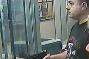 The armed offender at an ASB Bank branch in Mairangi Bay. Photo / NZ Police