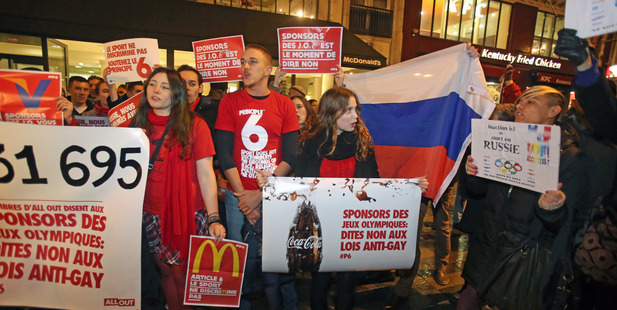 A group of gay rights activists demonstrate in front of McDonalds in Paris. Photo / AP