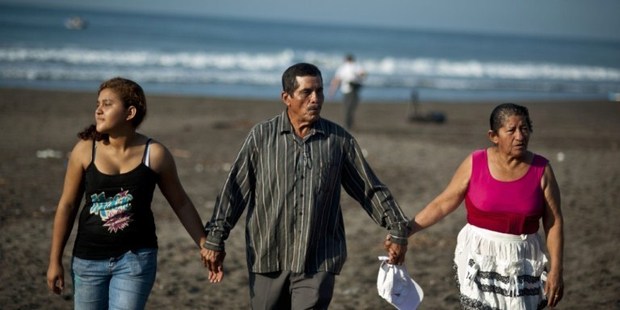 (L-R) The daughter and parents of Salvadorean castaway Jose Salvador Alvarenga, Fatima Mabea Alvarenga, Jose Ricardo Orellana and Maria Julia Alvarenga. Photo / AFP