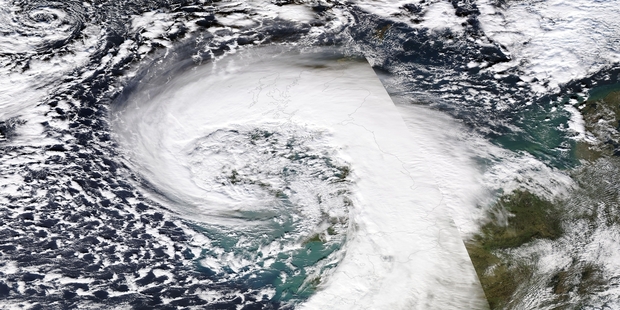 This Nasa image shows the huge storm wrapping itself around Britain.
