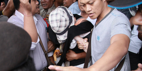 Schapelle Corby covers her face as she walks out of Kerobokan prison, in Bali. Photo / AAP