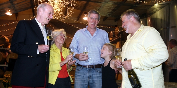 Robert and Robyn Wilson, Charles Banks, with his daughter Augusta Banks, 7, and John Hancock at Trinity Hill Winery. Photo/Paul Taylor
