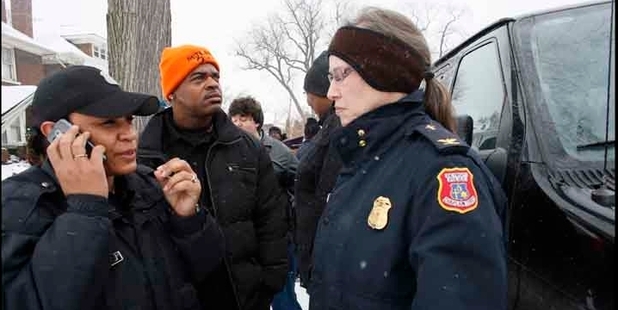 Detroit 300 president Eric Ford, above, marshalls the forces to help police in the battle against crime in Motor City. Photo / Angela Catlin