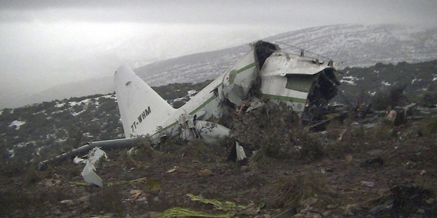 The wreckage of an Algerian military transport plane which slammed into a mountain in the country's rugged eastern region. Photo / AP