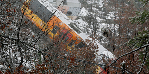 View of the derailed train after it was smashed by a boulder, outside the French town of Annot, southeastern France. Photo / AP