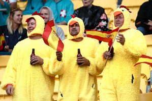 Three chickens braving the rain on day one of 5th round of the HSBC Sevens World Series. Photo / Mark Mitchell