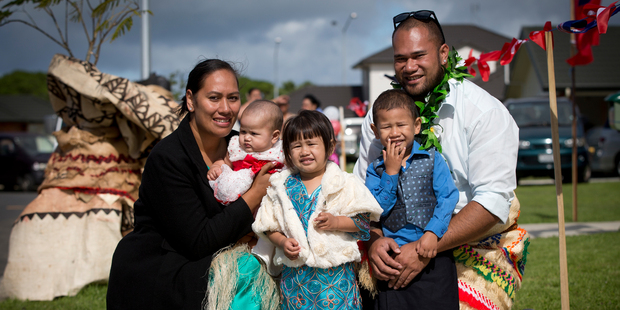 Fitalika (L) and Sione Leha'uli with their children at the opening of the Matanikolo Housing Project in Mangere. Photo / Sarah Ivey