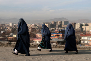 Afghan women walk along on the street in Kabul. Photo / AP