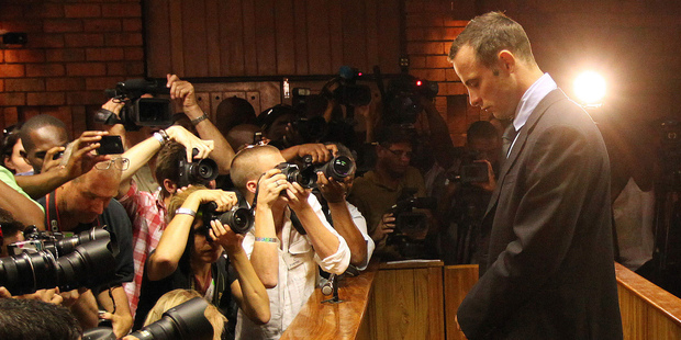 Oscar Pistorius has settled with a woman over a 2009 alleged assault case. Photo / AP