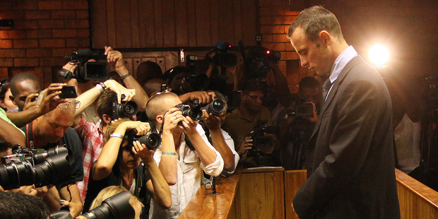 Olympic athlete Oscar Pistorius as he stands in the dock during his bail hearing at the magistrates court in Pretoria, South Africa. Photo / AP / Themba Hadebe