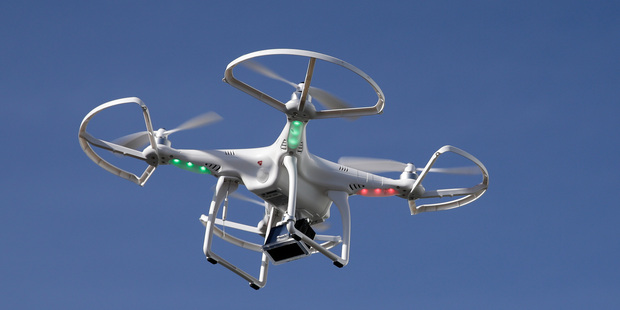 A drone fitted with a camera. Increasing use of the drones by journalists and others has prompted the US FAA to develop new rules around their use. Photo / AP