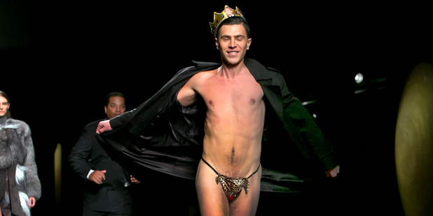 A streaker in a G-string, who interrupted the Prabal Gurung Fall 2014 collection. Photo / AP