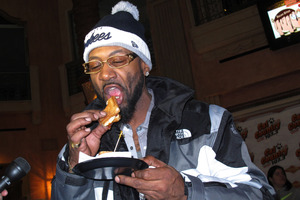 James Sanders eats a variety of bacon sandwich during the Bacon Week festival.
Photo / AP